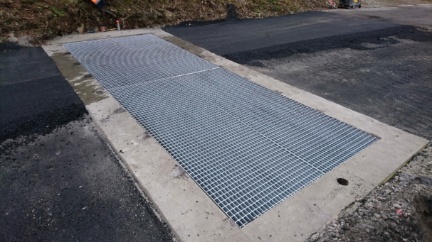 Mise en place des grilles "passage lourd"