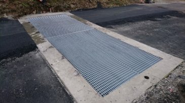 Mise en place des grilles "passage lourd"